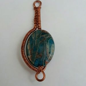 Handmade wire wrapped blue agate pendant
